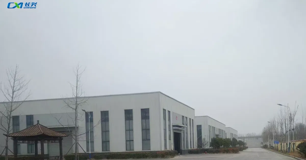 Warehouse buildings and campus grounds at Shandong Changxing Plastic Additives headquarters in Jining