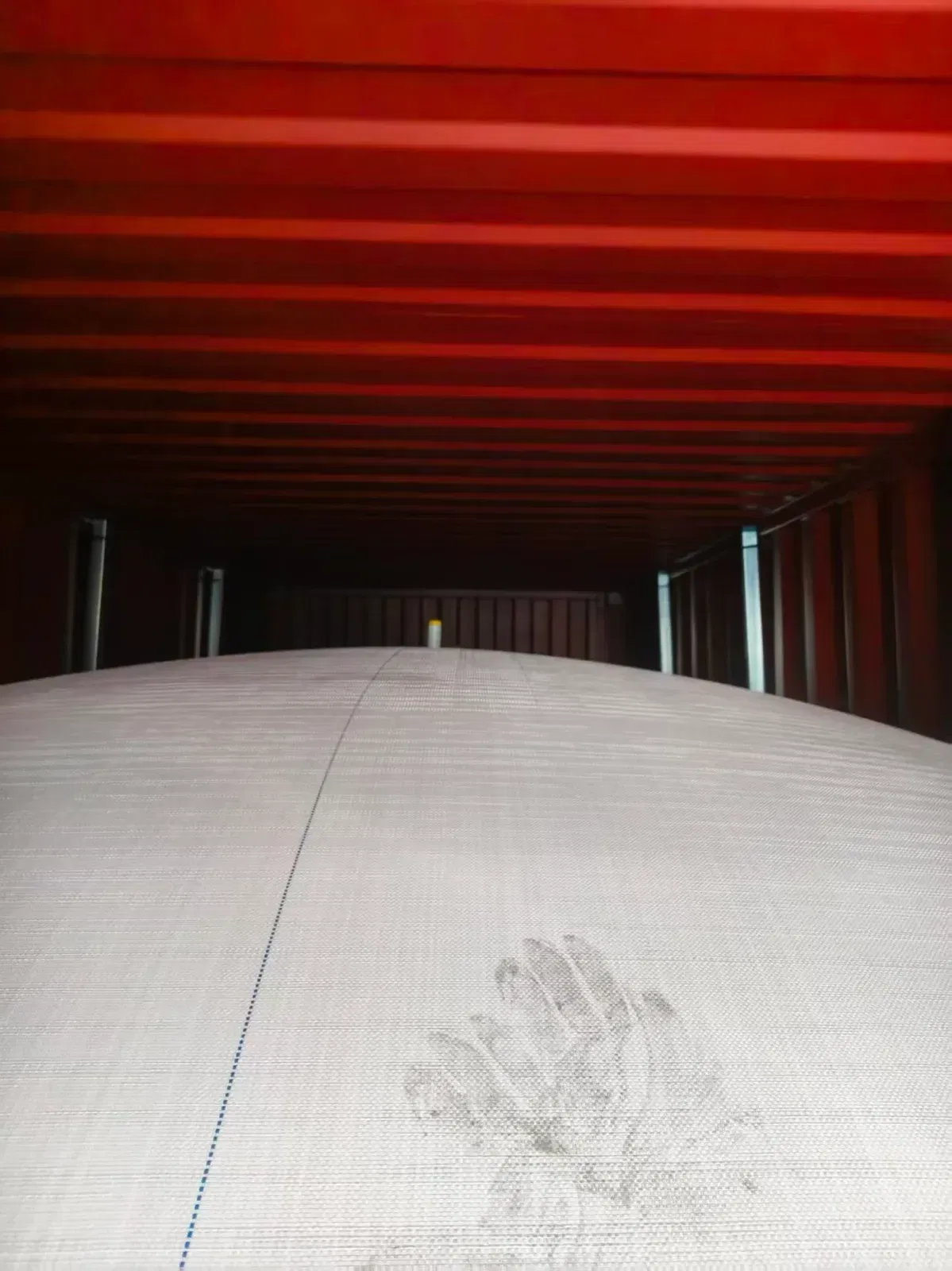 DOTP flexibag fully loaded and ready for shipment — container doors open showing filled flexitank